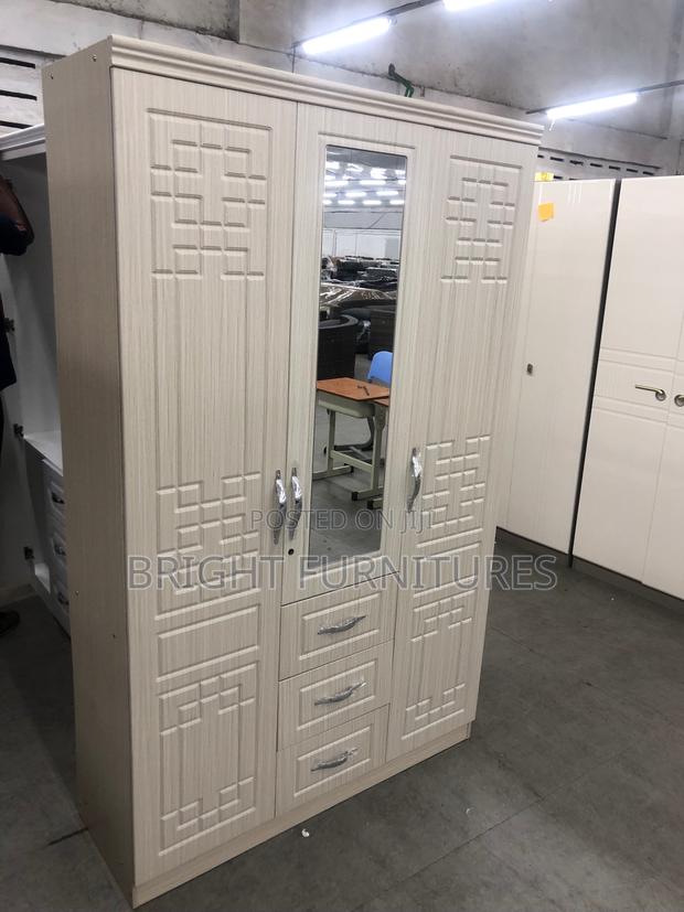 Foreign Three Doors Wardrobe With Drowners and Mirror · Photo 3