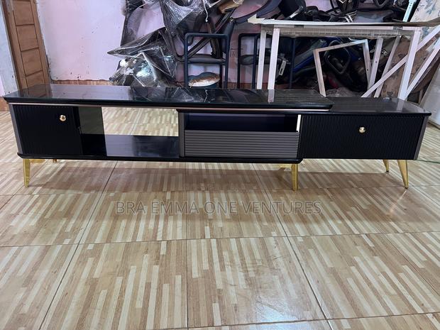 Nicely Designed Tv Stand With Drawers · Photo 3