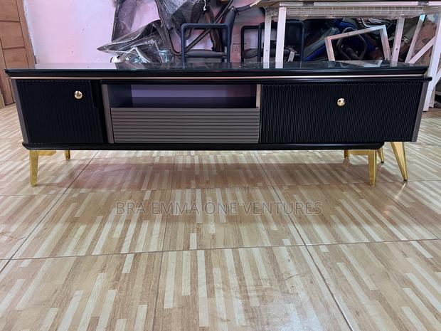 Nicely Designed Tv Stand With Drawers · Photo 4