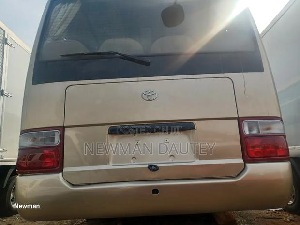 Toyota Coaster 2009 Brown