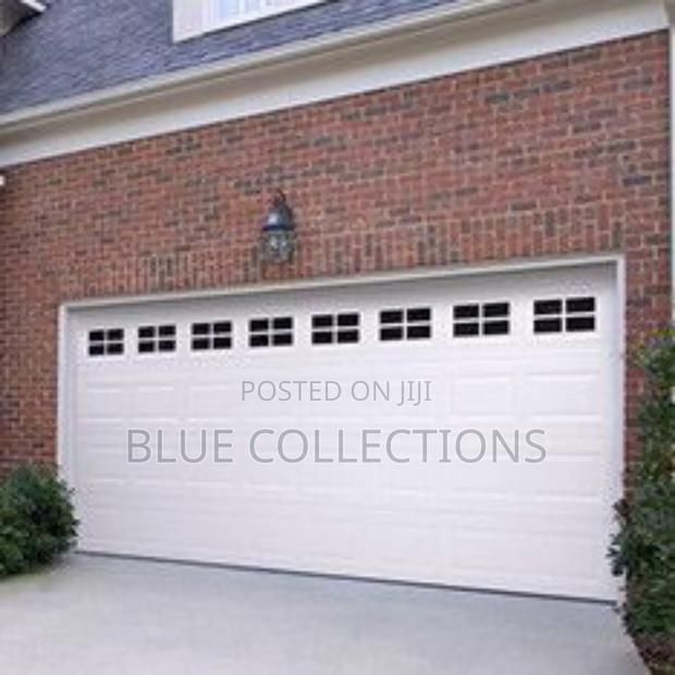 18ft Automated Garage Door · Photo 2