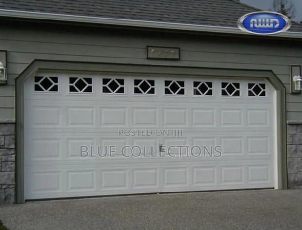 18×8 Canadian Garage Door With Fanlight · Photo 2