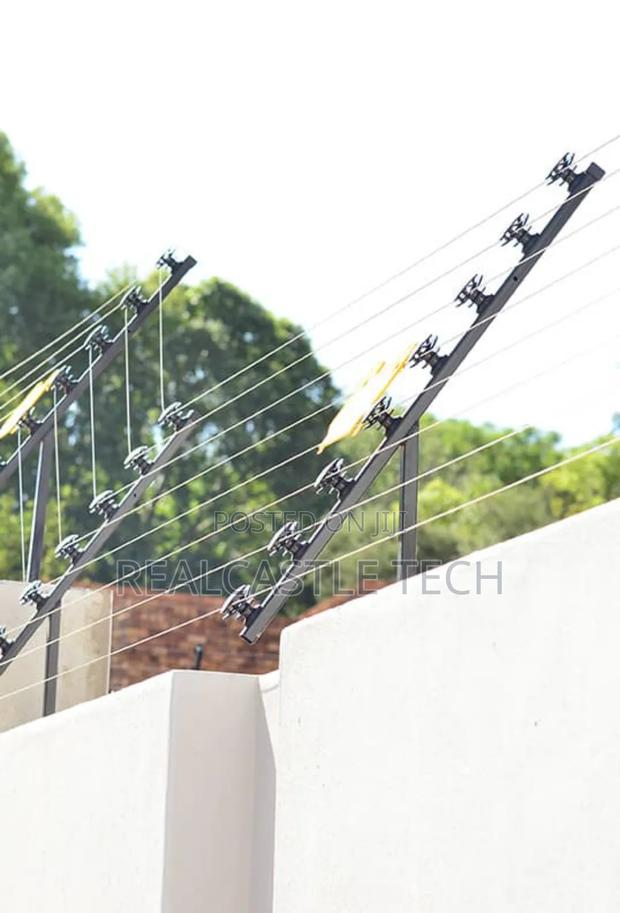 Installation of Electric Fence and Razor Wires photo 2