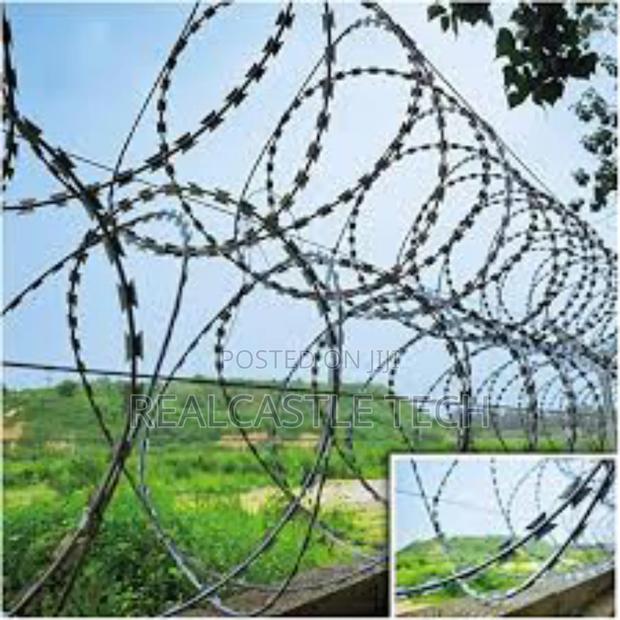 Installation of Electric Fence and Razor Wires photo 4