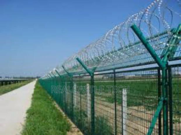 Installation of Electric Fence and Razor Wires photo 5