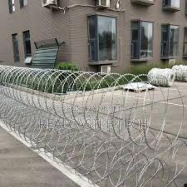 Installation of Electric Fence and Razor Wires photo 6