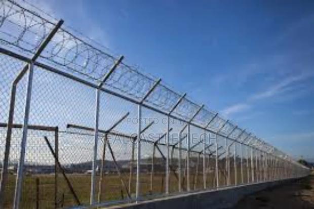 Installation of Electric Fence and Razor Wires photo 7