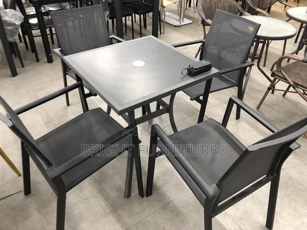 Foreign Quality Outdoor Table With Four Chairs · Photo 4