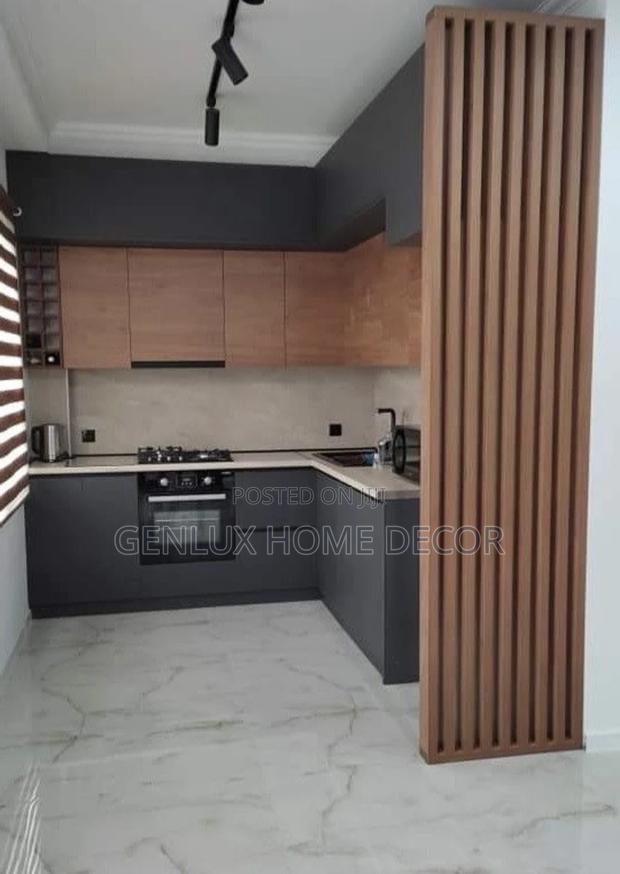 Hidden Handle Kitchen Cabinets for a Seamless Look · Photo 2