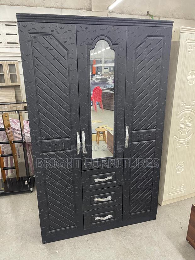 Imported Three Doors Wardrobe With Drawers and Mirror · Photo 4