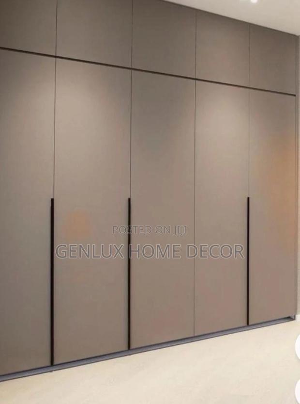 Floor-to-Ceiling Wardrobes for Maximum Storage · Photo 4