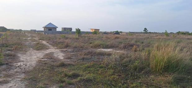 Valuable Gated Half Plot at Prampram Beach Road · Photo 3
