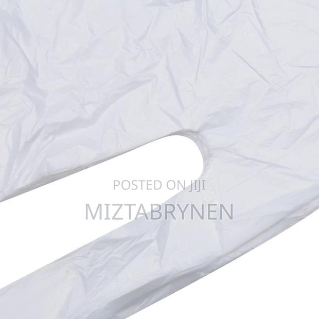 100 White Lightweight Poly Disposable Aprons photo 5