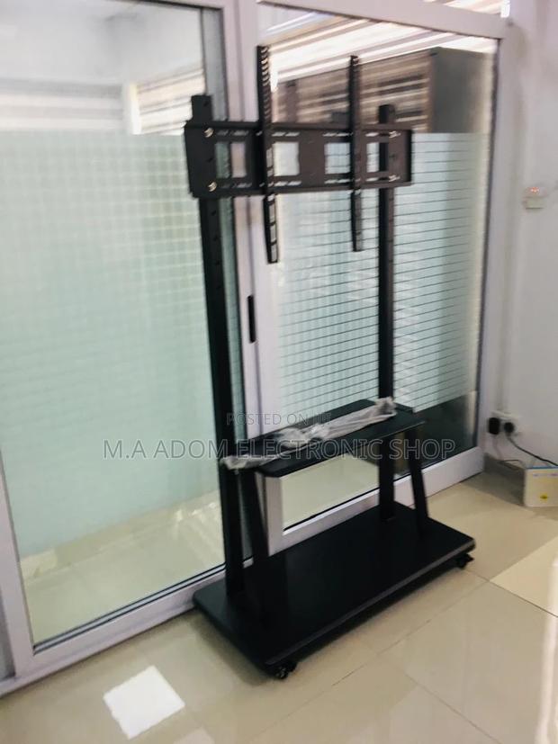 Heavy Duty Rolling TV Cart for 60"-100" Screens · Photo 2