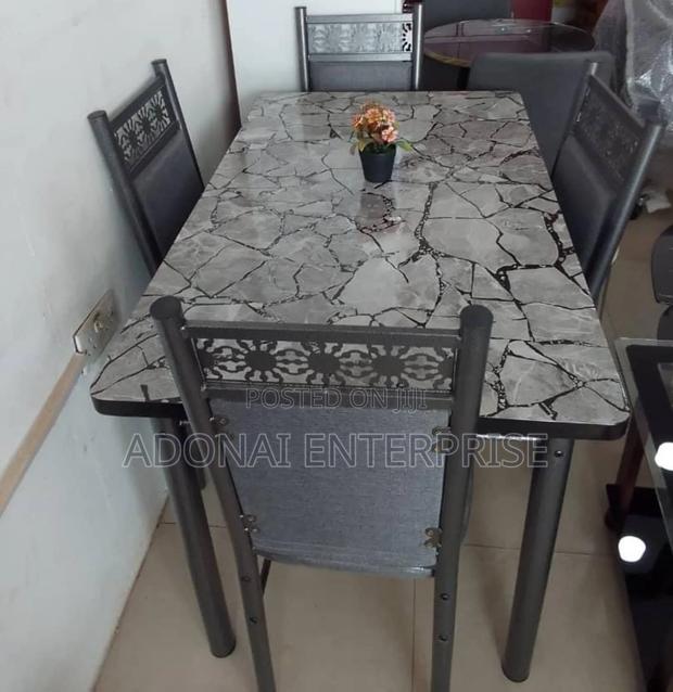 Dining Table and Chairs Available CXGT · Photo 1