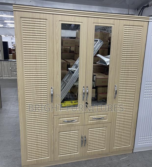 Modern Foreign 4 Doors Wardrobe With Drawers and Mirror · Photo 4