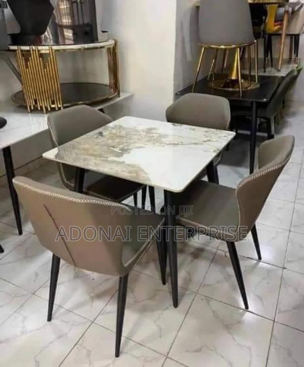 Dining Table and Chairs Available VV65RYU · Photo 1
