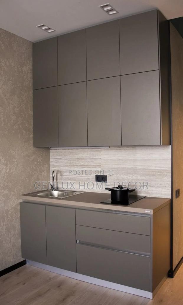 Minimalist Matte-Finish Kitchen Cabinets for a Modern Touch · Photo 2
