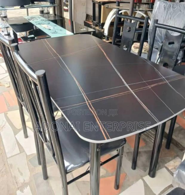 Affordable Glass Dining Set 4 Chairs · Photo 1