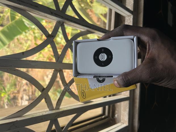Work From a Café,Beach,Or Mountain—MTN Mifi Keeps You Online · Photo 1
