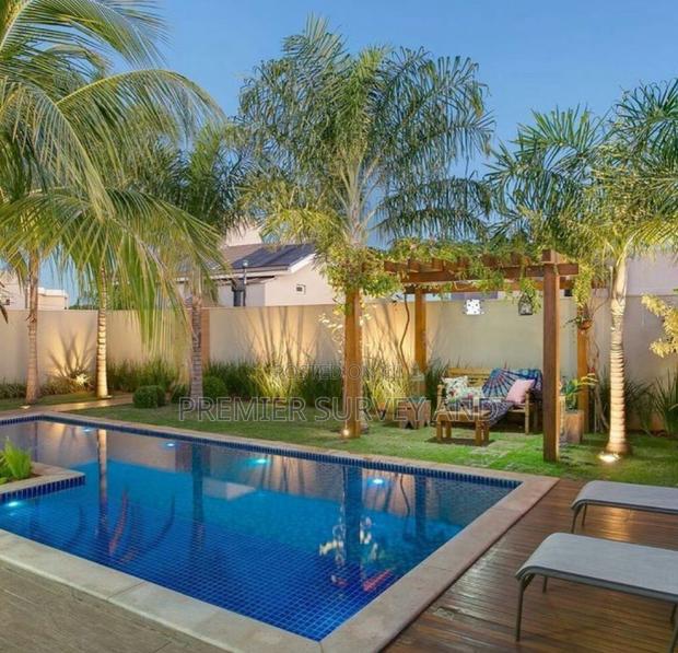 Swimming Pool Designs for Your Backyard · Photo 4