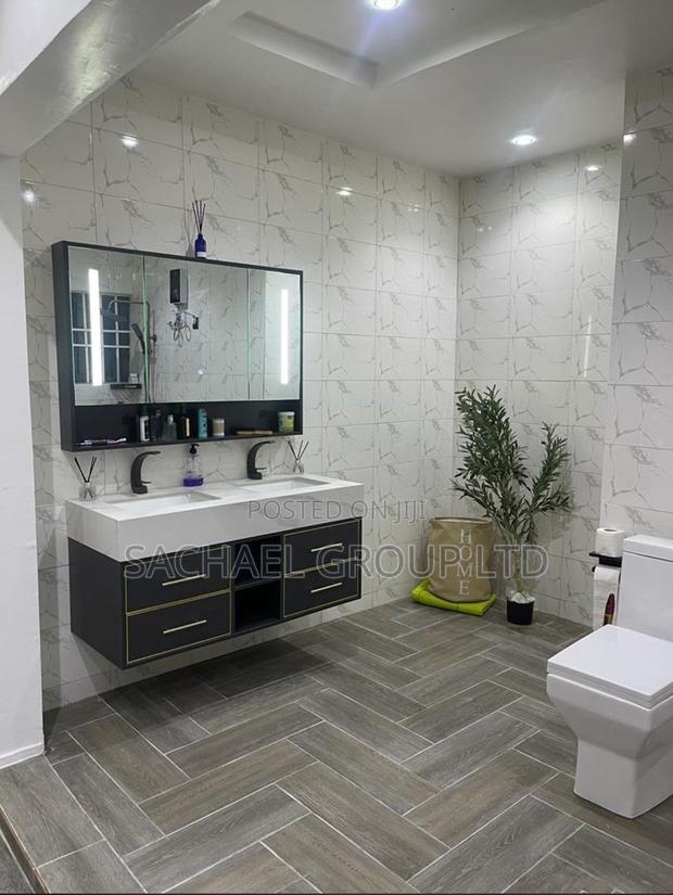 Double Sink Vanity Cabinet · Photo 3