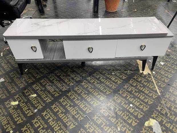 Modern Luxury Adjustable Glass Top Tv Stand With Drawers · Photo 4