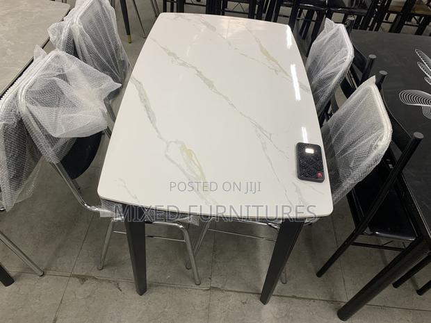 Marble Dining Table With Chairs for Living Rooms · Photo 3