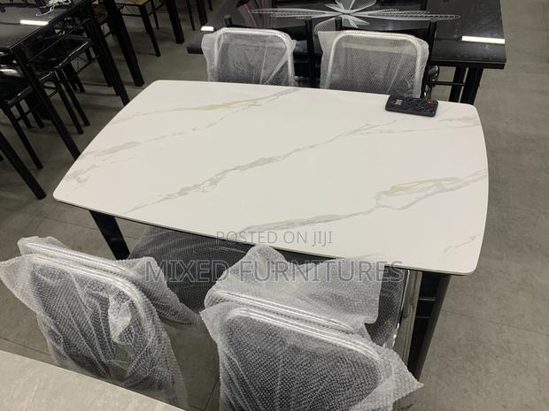 Marble Dining Table With Chairs for Living Rooms · Photo 4