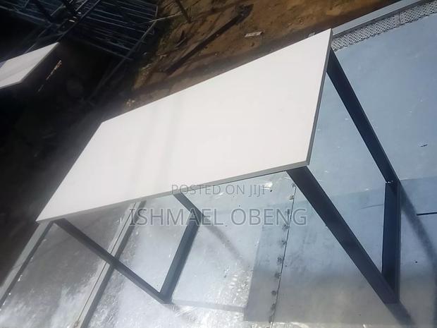 Strong Metal With Laminated Plywood Table · Photo 1