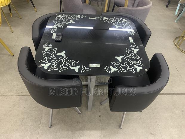 Glass Dining Table Top With 4 Leather Chairs · Photo 4