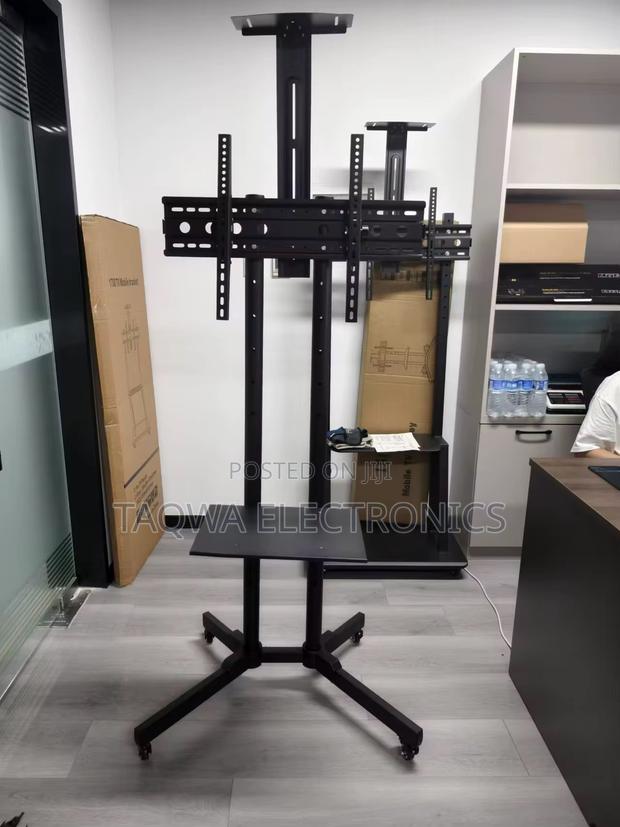 Up to 70 Inch Movable Tv Stand · Photo 2