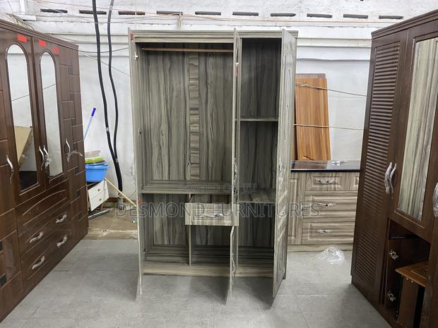 Three Doors Wardrobe With A Mirror 8153 photo 2