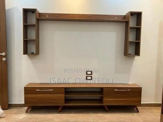 TV Wall Mount With Shelves · Photo 3