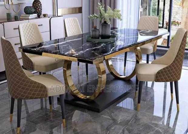 Dining Table and Chairs Bkivxf486jbh · Photo 1