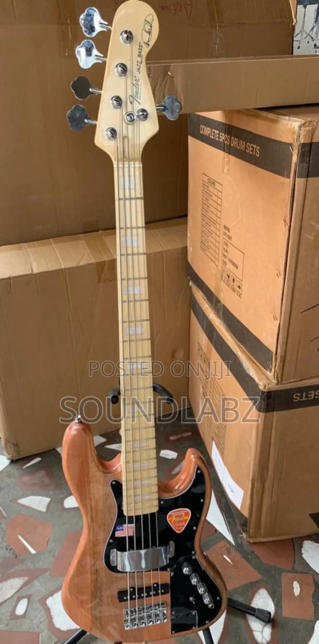 Brown Coloured Active Fender Bass Guitar · Photo 3
