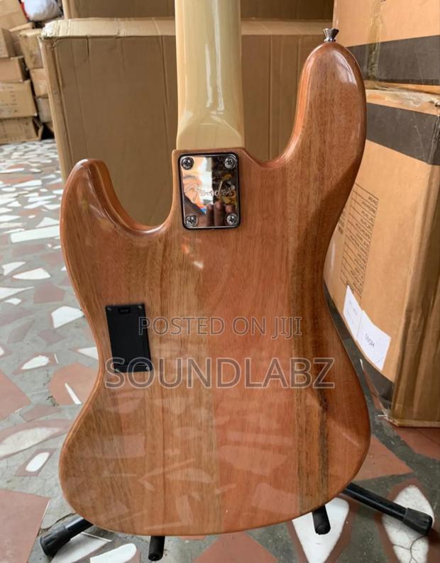 Brown Coloured Active Fender Bass Guitar · Photo 4