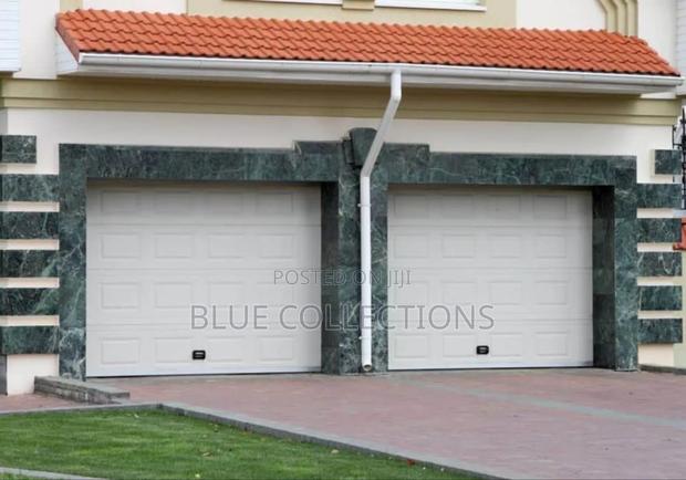 Double Panels Garage Doors · Photo 2