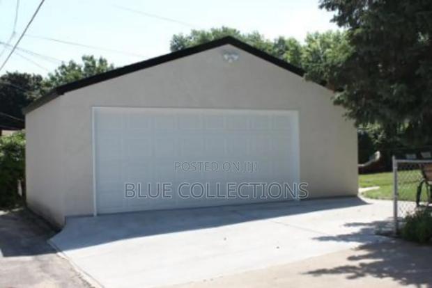 Double Panel Garage Doors · Photo 2