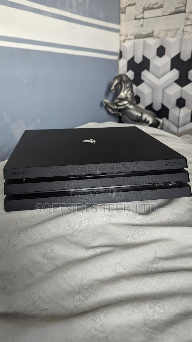 Playstation 4 Pro Jailbreak With 13 Games and Controller · Photo 4