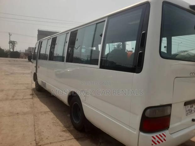 Car Rental- 29 Seats Bus- Toyota Coaster Bus for Rent · Photo 4