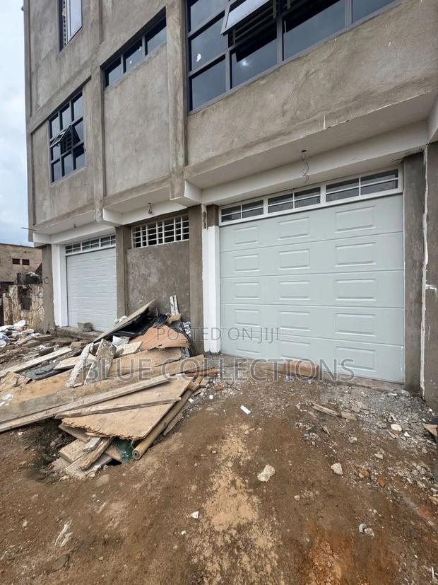Garage Door With Fanlight and Remote photo 2