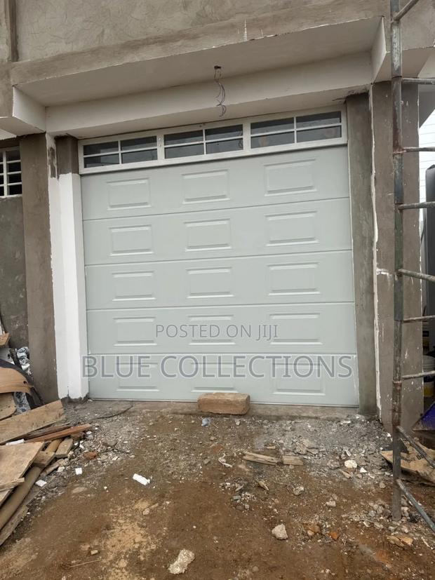 Double Garage Doors · Photo 3