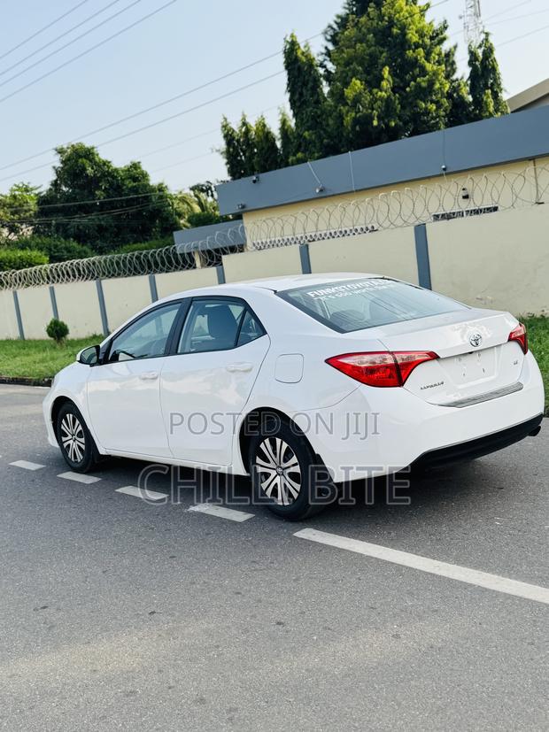 Toyota Corolla LE Eco (1.8L 4cyl 2A) 2018 White photo 8