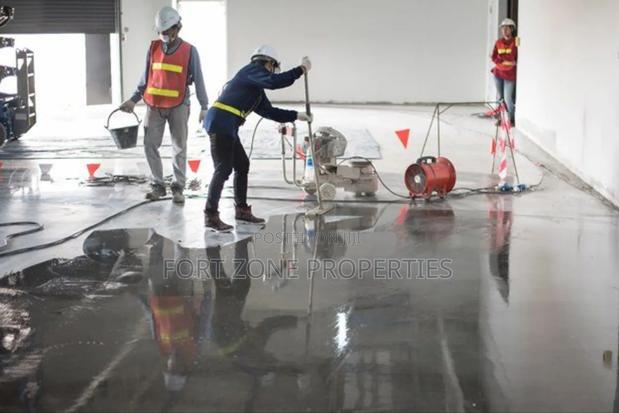 Ghana Man Cleaning With Cleantex · Photo 4