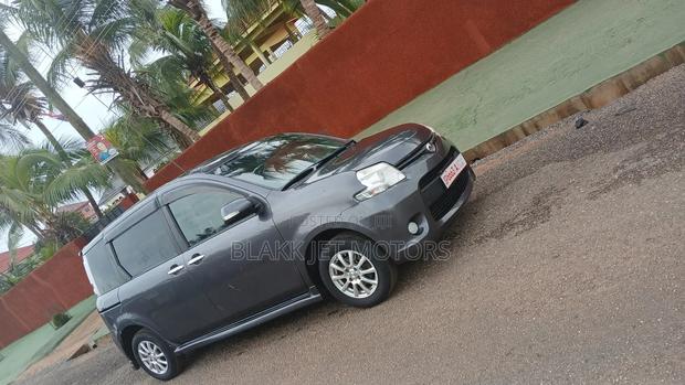 Toyota Sienta 1.5 AWD 2013 Gray · Photo 3