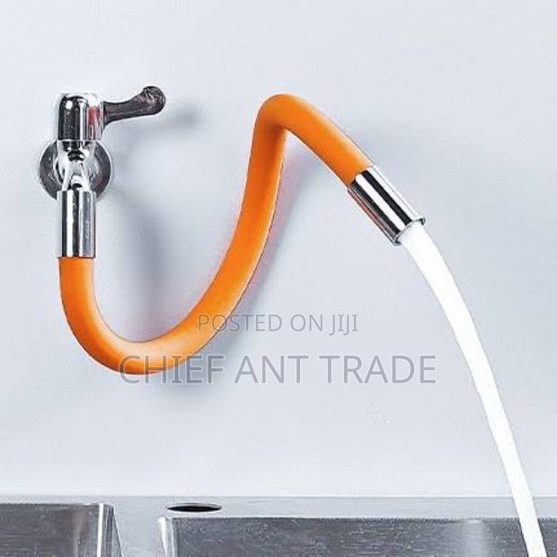 Tap Extension / Faucet Extension. Orange Tube · Photo 2
