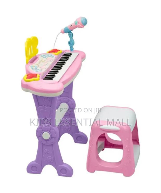 Keyboard or Piano With Stand and Chair · Photo 4