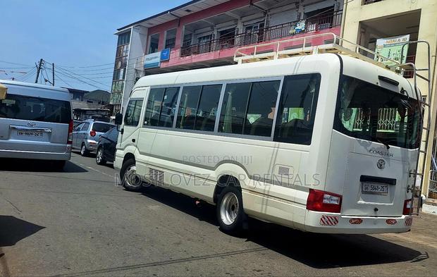 Rent a Car - Toyota Coaster 28 Seat for Rent in Ghana · Photo 4