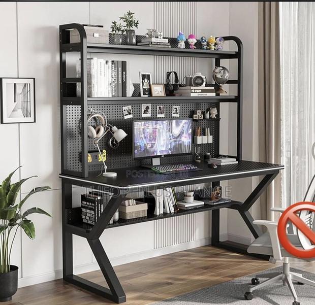 Double Decker Study Table With 2 Shelves and Pegboard. · Photo 3